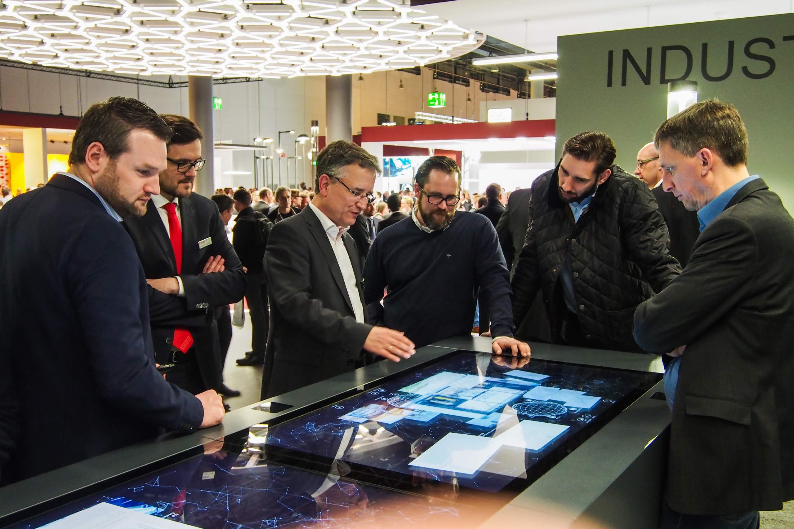 trilux unity trade fair application booth with multitouch table